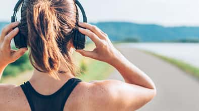 Läuferin mit Kopfhörer